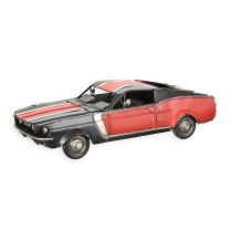 A TIN MODEL OF A MUSCLE CAR