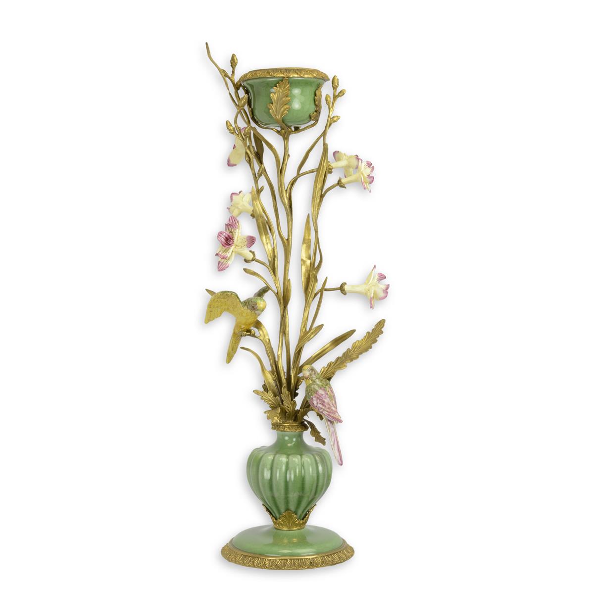 A BRONZE MOUNTED PORCELAIN CANDLE HOLDER