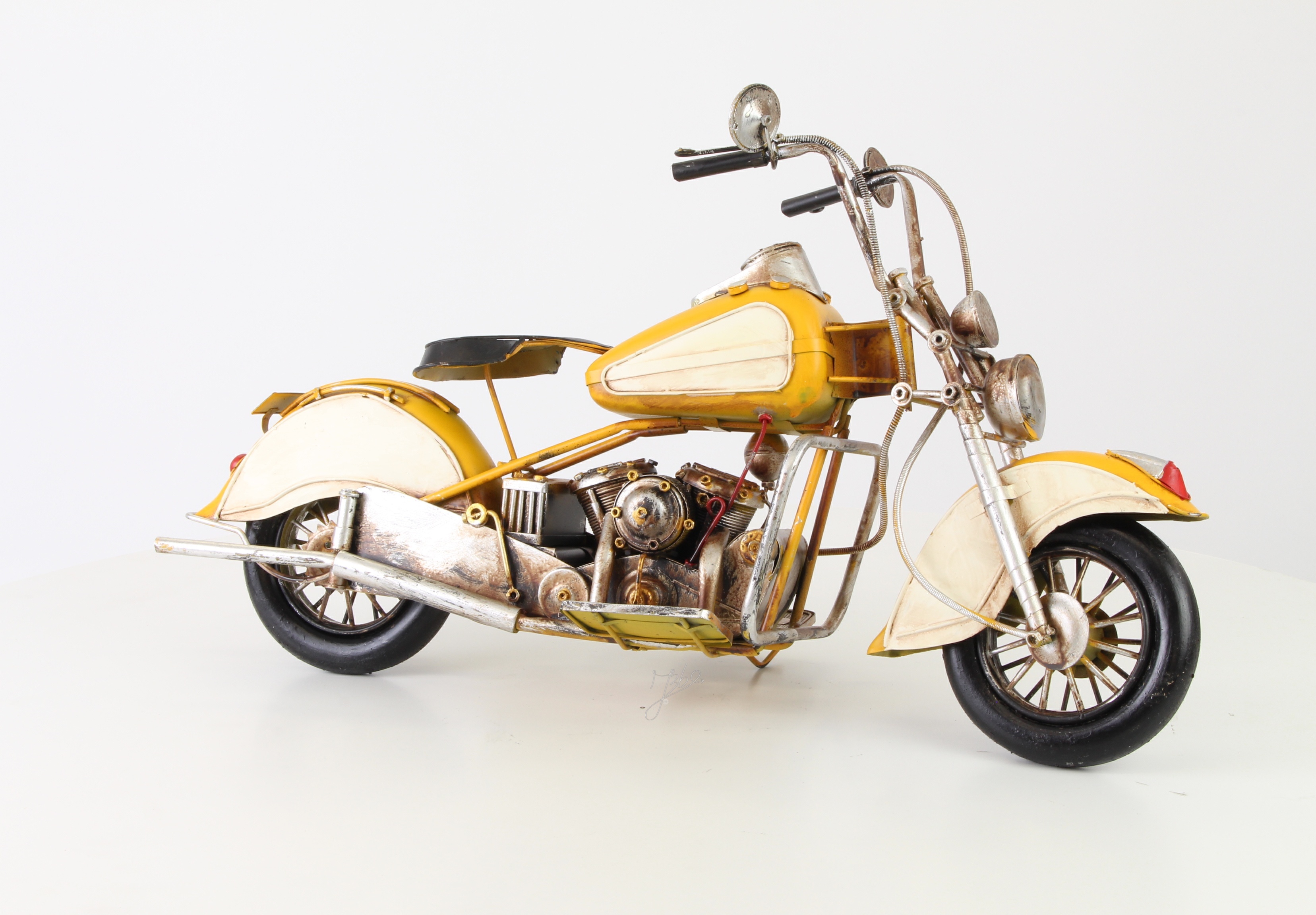 A TIN MODEL OF A MOTORCYCLE