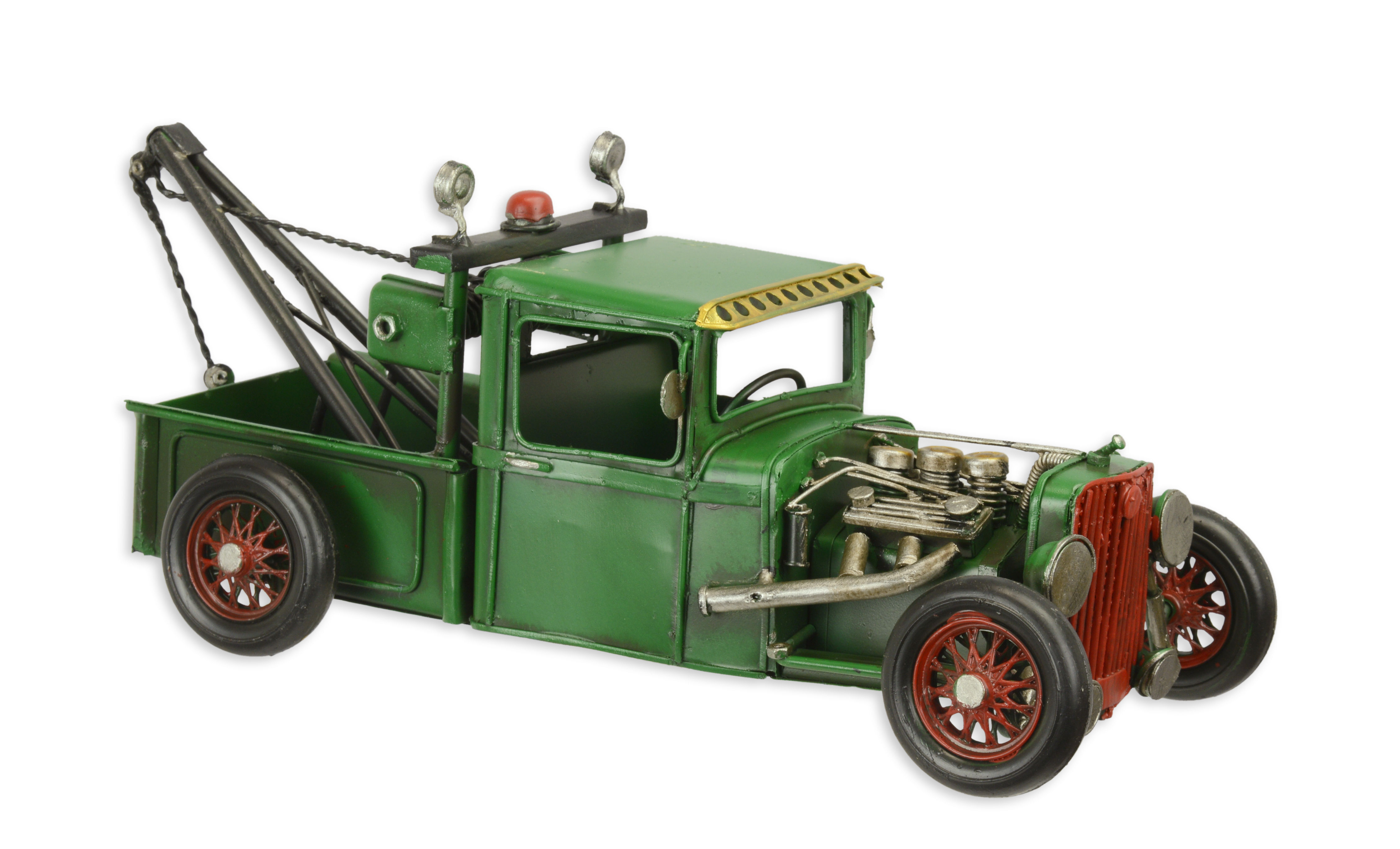A TIN MODEL OF A HOT ROD TOW TRUCK