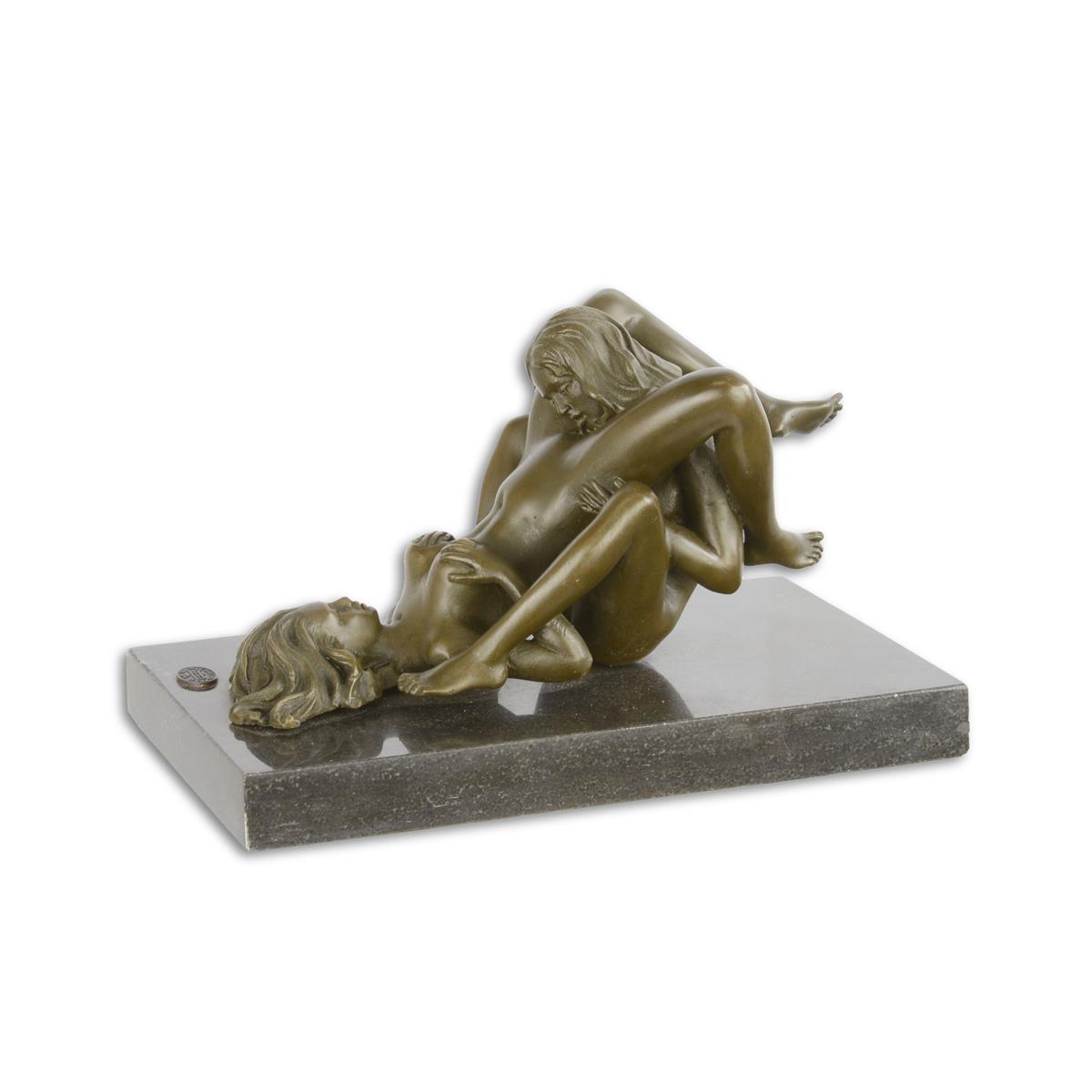 AN EROTIC BRONZE SCULPTURE OF TWO FEMALE NUDES DOING ORAL