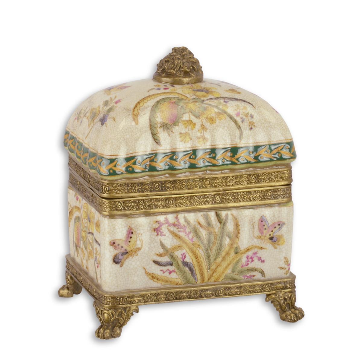 A BRASS MOUNTED PORCELAIN BOX AND COVER