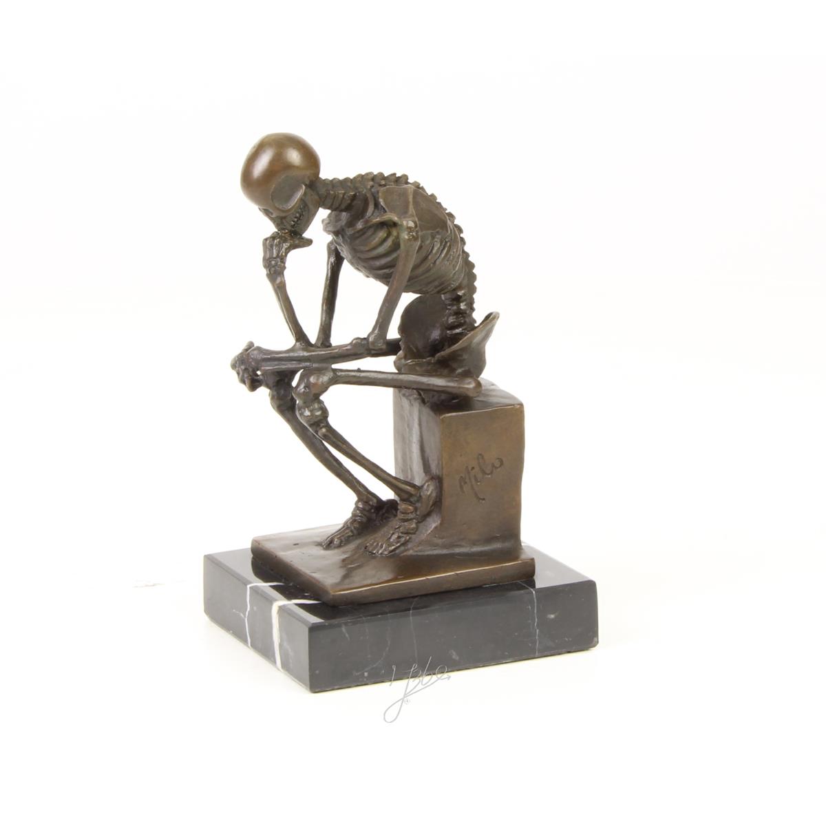 A BRONZE SCULPTURE OF THE SKELETON THINKER