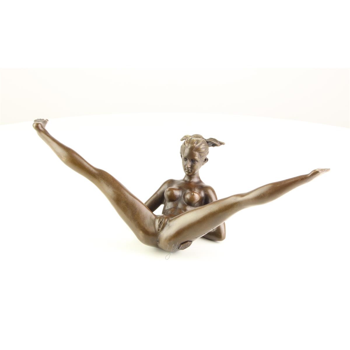 AN EROTIC BRONZE SCULPTURE OF A FEMALE NUDE